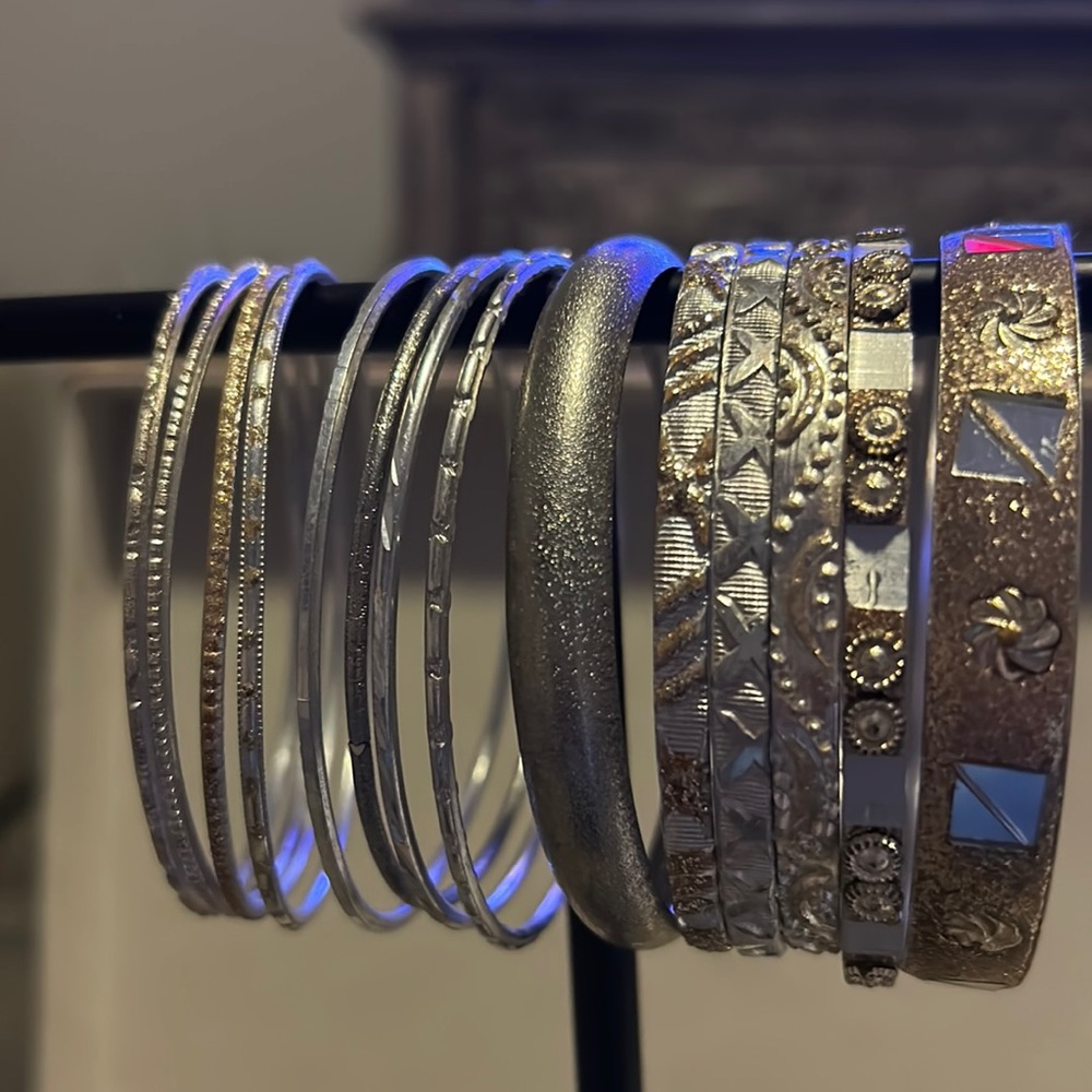 13 bangle silver and gold bangle bracelets.